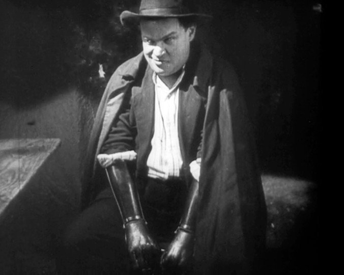 a man. a plan. a wooden hand.